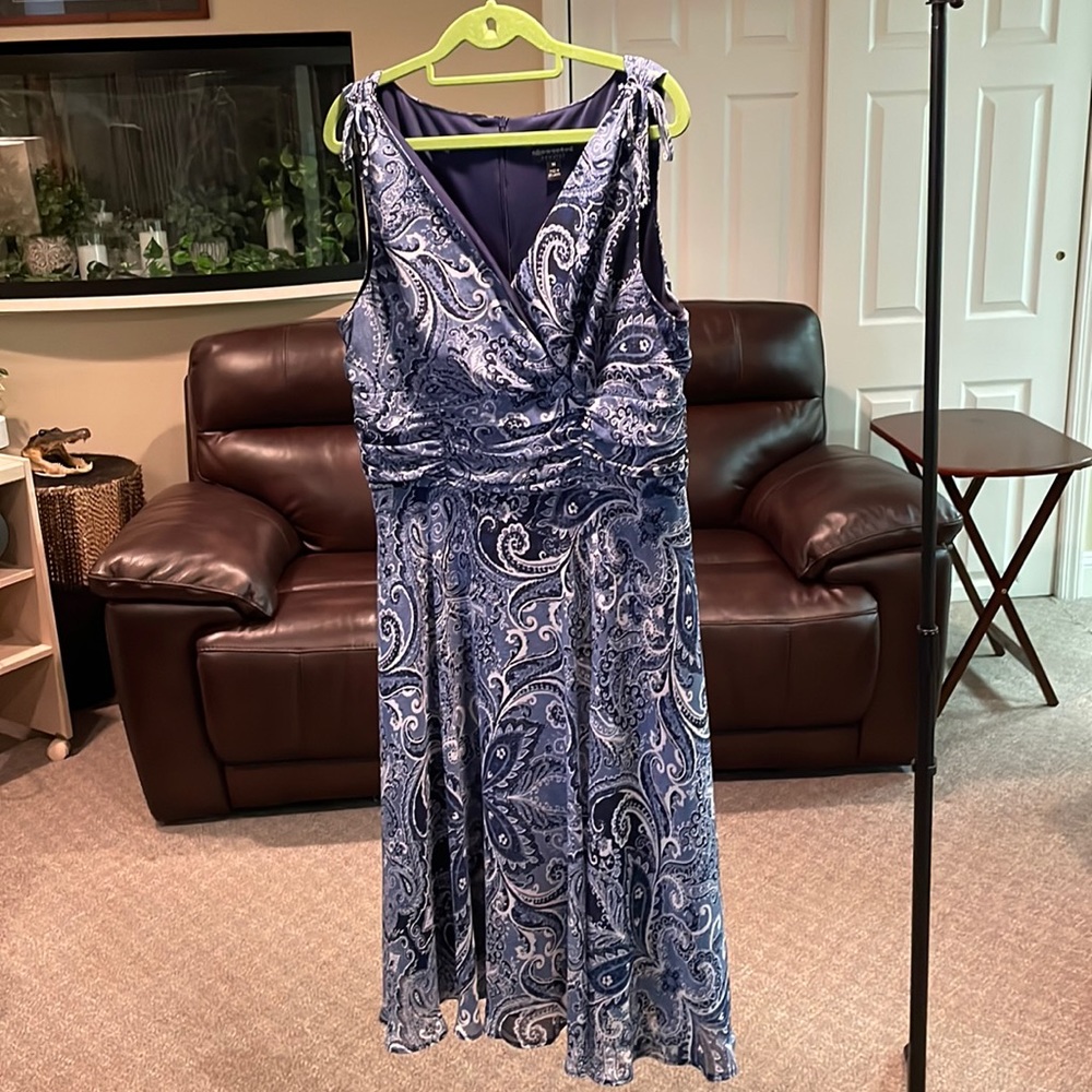 Gently worn, mid length dress